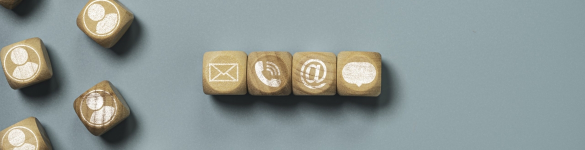 Customer service and business contact concept, wooden cube block which print screen letter , telephone email address and message.